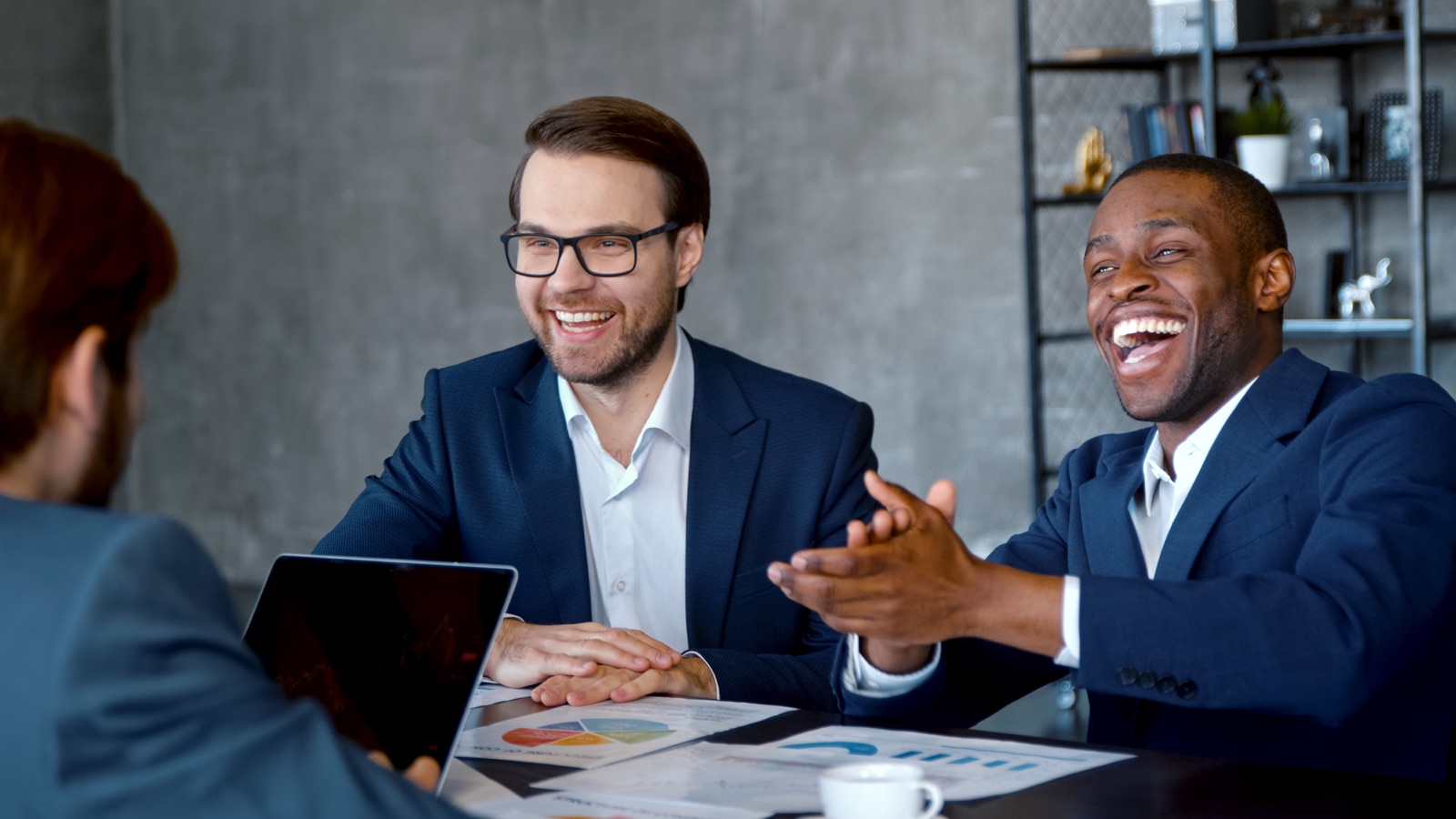 A senior B2B revenue operations team in a meeting